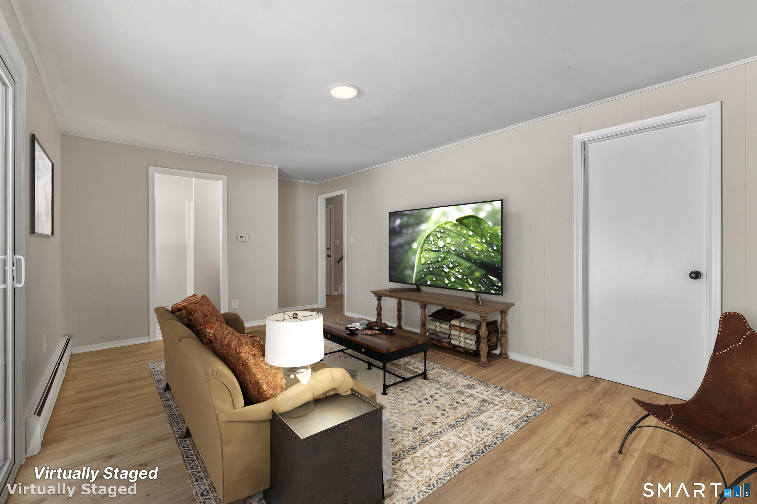 38 Mildred Road West Hartford, CT 06107 - Photo 24 of 35 a living room with furniture and a window