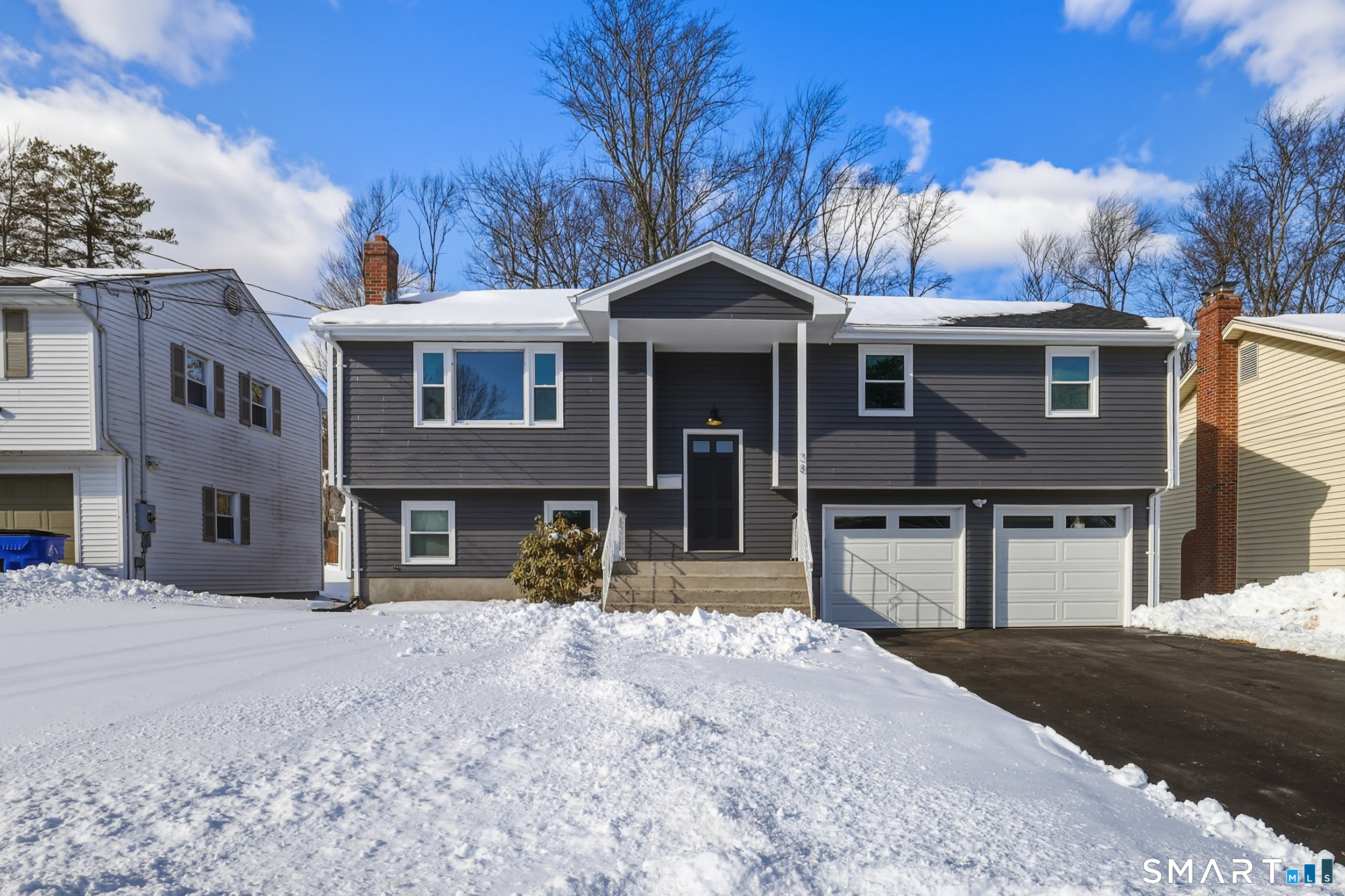 38 Mildred Road West Hartford, CT 06107 - Photo 35 of 35 a front view of a house with a yard