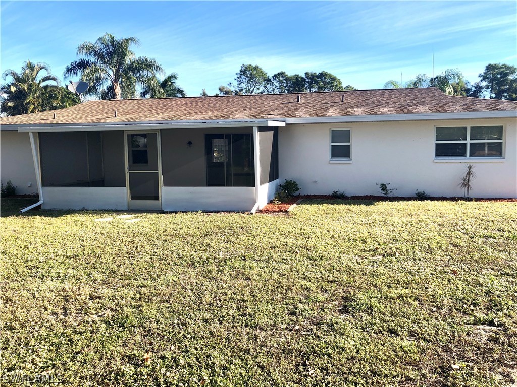 7356 Barragan Road Fort Myers, FL 33967 - Photo 20 of 23 a house view with a garden space