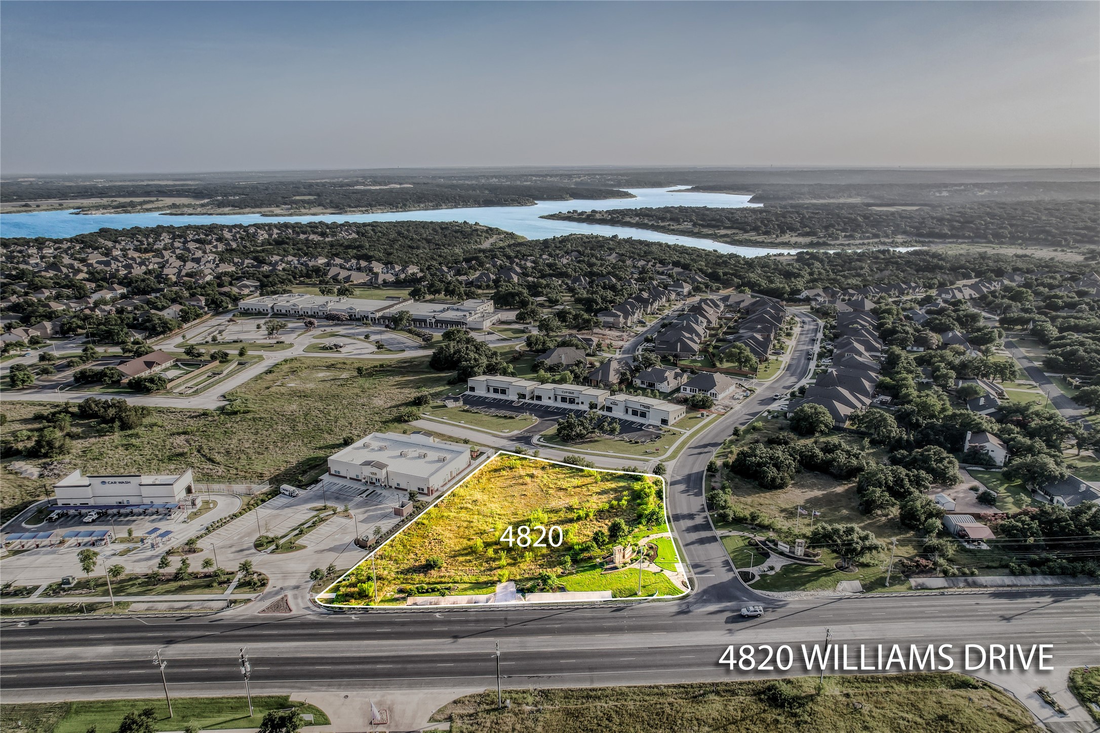 4820 Williams Drive Georgetown, TX 78633 - Photo 2 of 18 an aerial view of residential building and ocean view