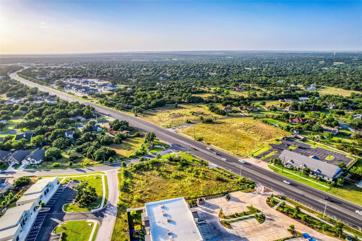 4820 Williams Drive Georgetown, TX 78633 - Photo 4 of 18 an aerial view of residential houses with outdoor space
