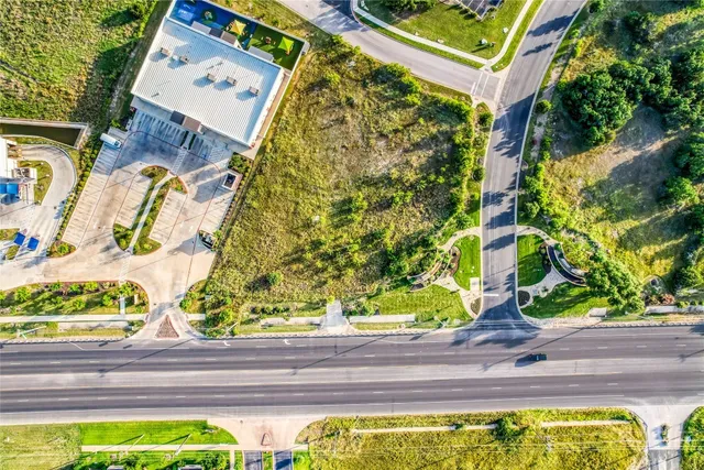 a view of a swimming pool from a balcony