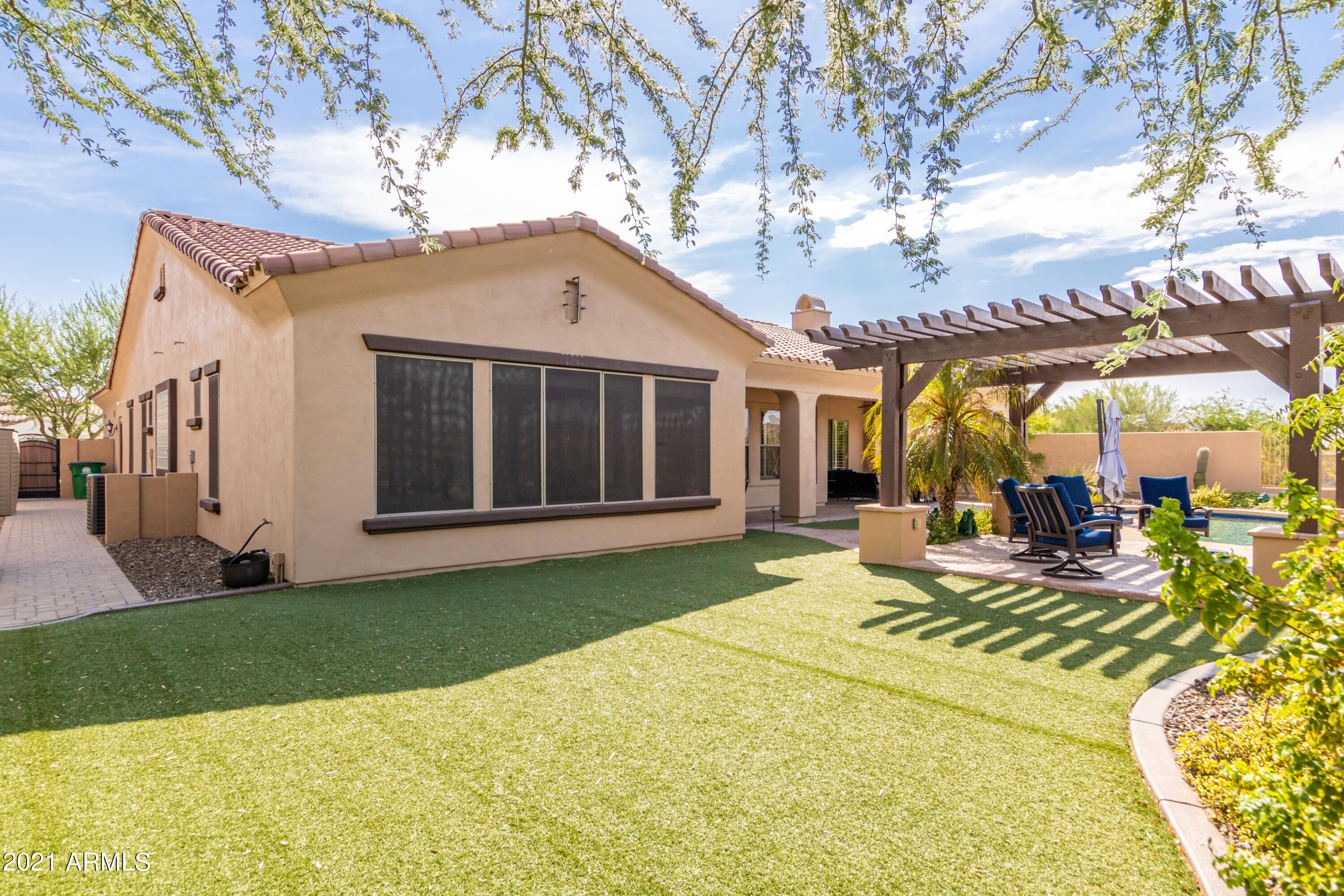17984 West Narramore Road Goodyear, AZ 85338 - Photo 109 of 149 a view of a house with a yard patio and a patio