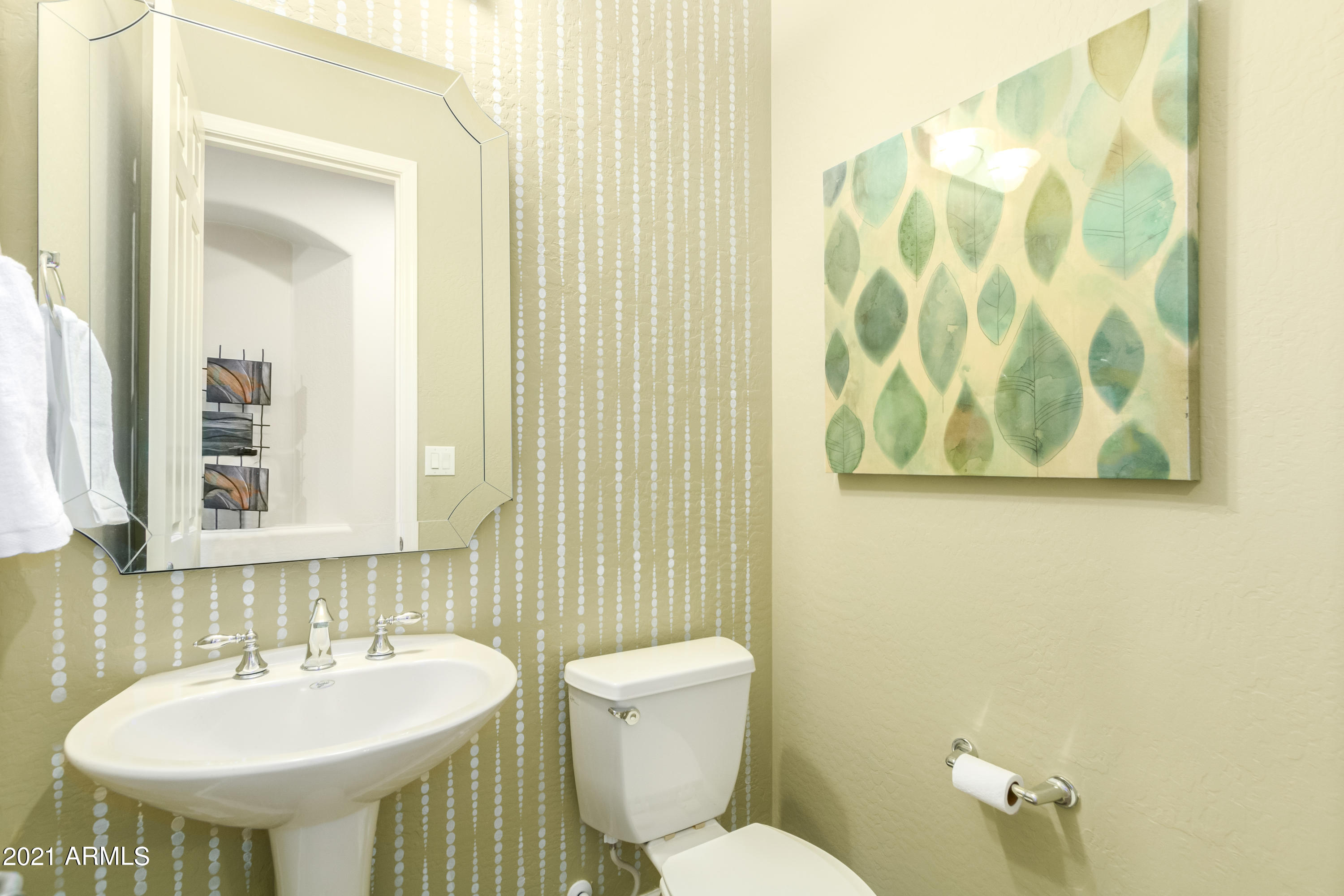 17984 West Narramore Road Goodyear, AZ 85338 - Photo 57 of 149 a bathroom with a sink and a toilet