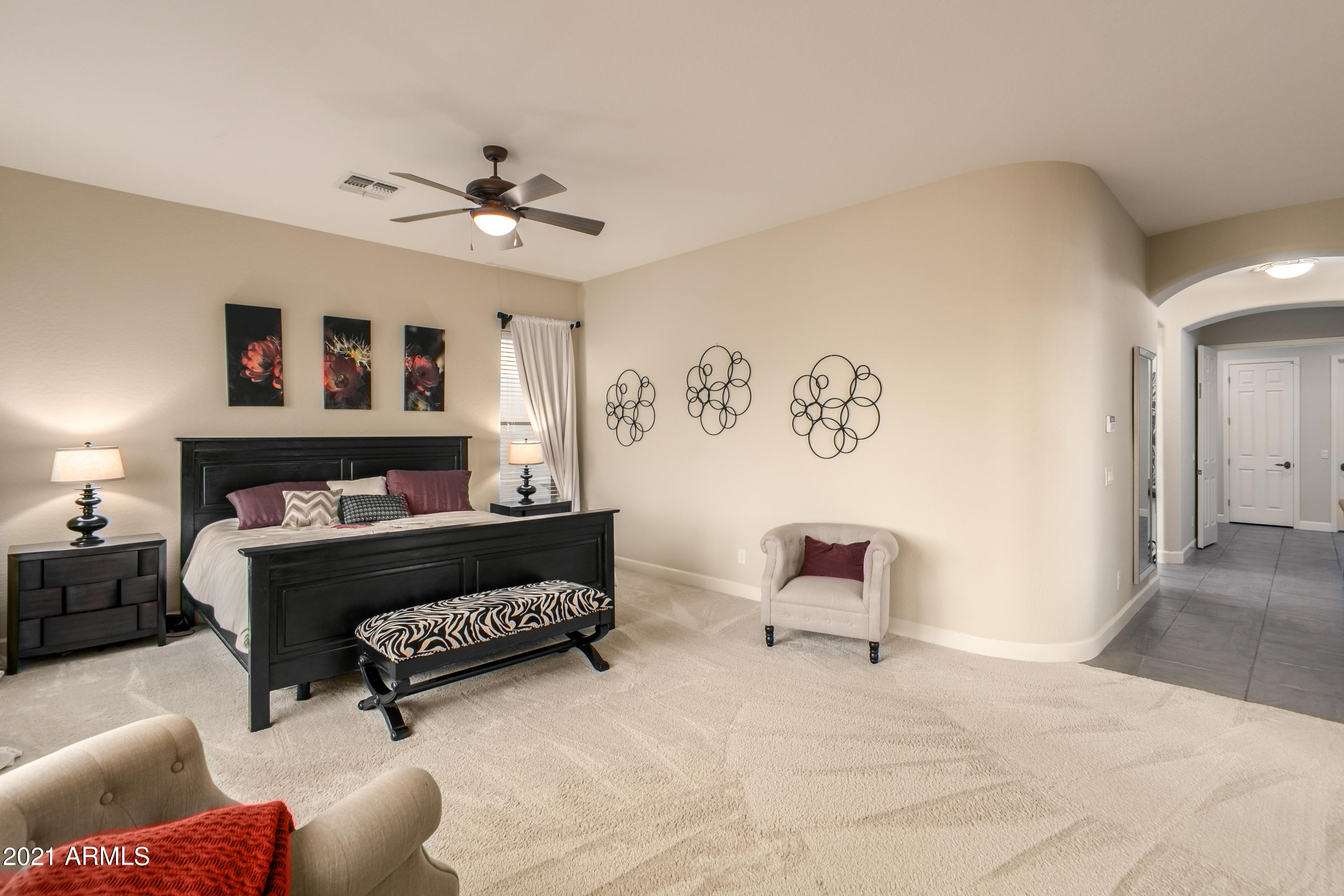 17984 West Narramore Road Goodyear, AZ 85338 - Photo 59 of 149 a living room with furniture and a fireplace