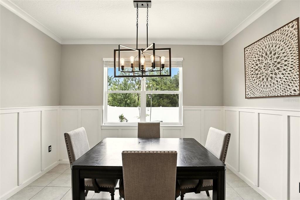 726 Porter Rye Avenue DeBary, FL 32713 - Photo 13 of 44 a dining room with furniture and window