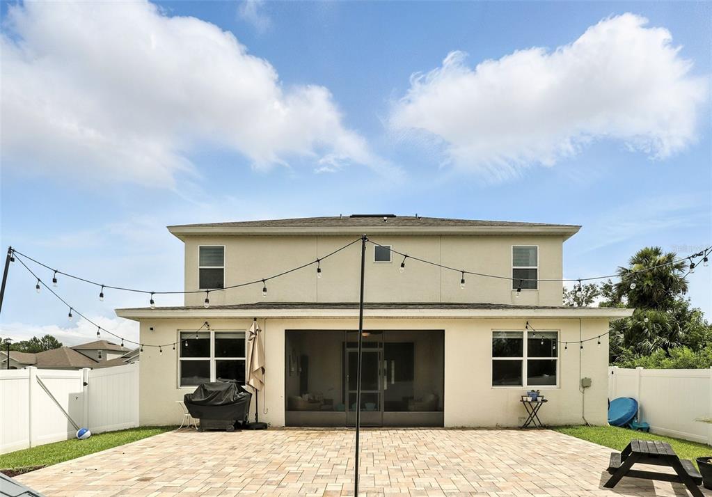726 Porter Rye Avenue DeBary, FL 32713 - Photo 39 of 44 a view of a house with a barbeque