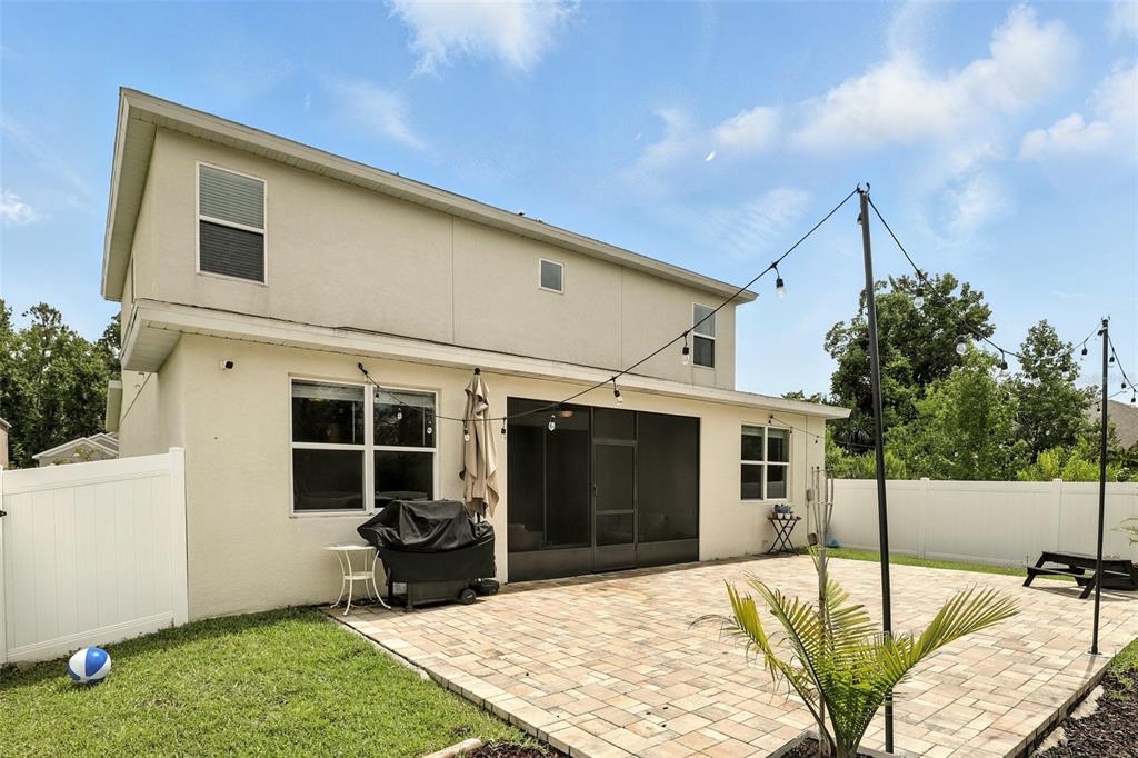 726 Porter Rye Avenue DeBary, FL 32713 - Photo 40 of 44 a house view with a backyard space