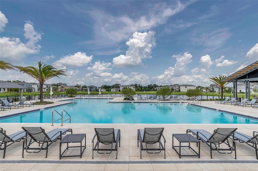 726 Porter Rye Avenue DeBary, FL 32713 - Photo 43 of 44 a view of a lake with furniture