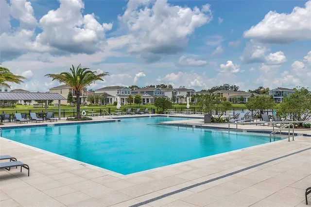 a view of a swimming pool and a lake view