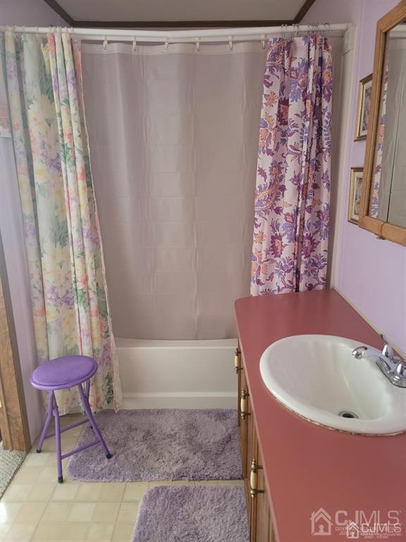 5 Emerson Road North Brunswick, NJ 08902 - Photo 24 of 28 a bathroom with a bathtub and shower