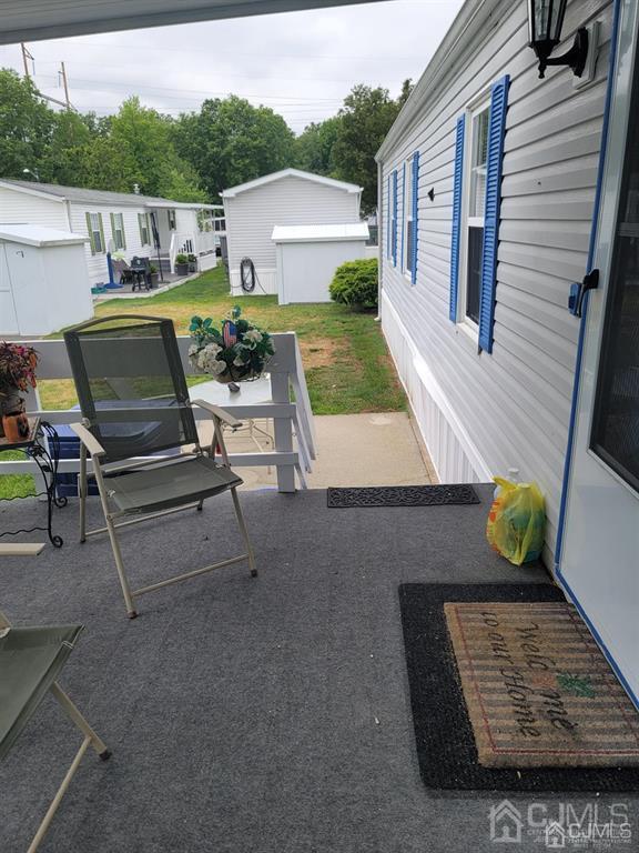 5 Emerson Road North Brunswick, NJ 08902 - Photo 28 of 28 a view of a terrace with chairs