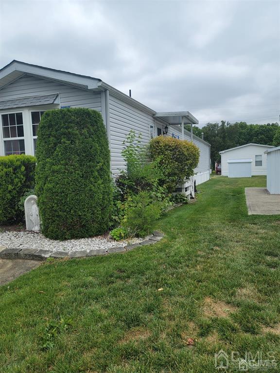5 Emerson Road North Brunswick, NJ 08902 - Photo 3 of 28 a view of a back yard of the house