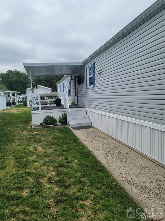 5 Emerson Road North Brunswick, NJ 08902 - Photo 4 of 28 a view of a backyard with furniture and garden