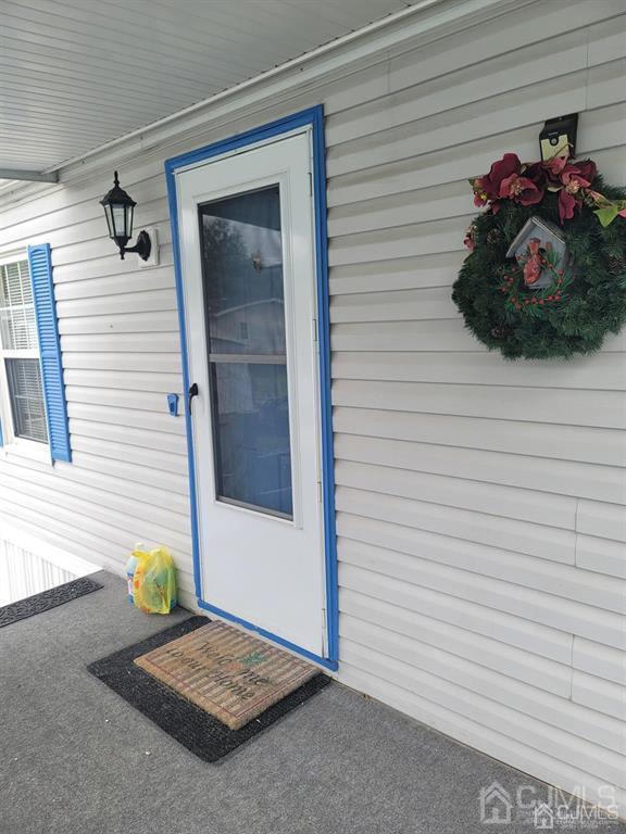 5 Emerson Road North Brunswick, NJ 08902 - Photo 7 of 28 a view of a entryway in front of house
