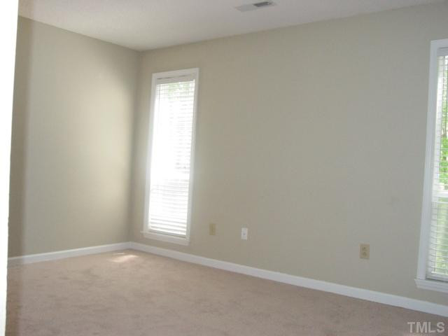 4611 Timbermill Court, Unit 202 Raleigh, NC 27612 - Photo 15 of 22 Master Bedroom