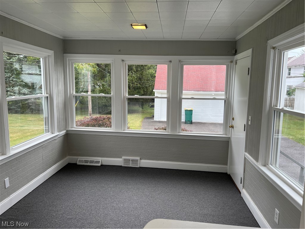 19003 Libby Road Maple Heights, OH 44137 - Photo 13 of 30 Sunroom, new carpet.