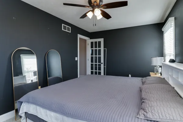 a kitchen with stainless steel appliances granite countertop a sink stove and microwave