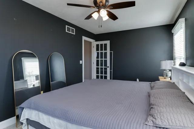 a kitchen with stainless steel appliances granite countertop a sink stove and microwave