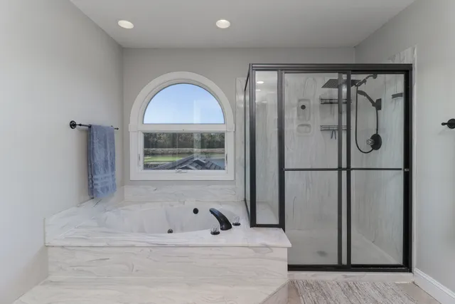 a bathroom with a sink toilet and vanity