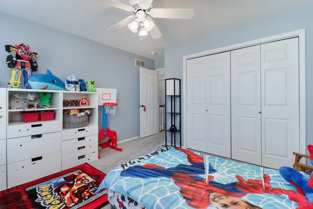 a bathroom with a shower and a toilet