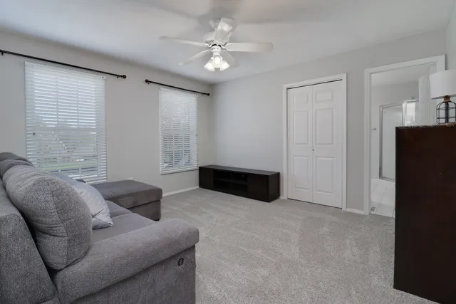 an aerial view of a house with a garden