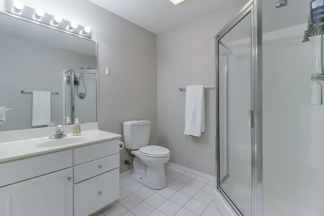 a view of a swimming pool with an outdoor seating and a yard