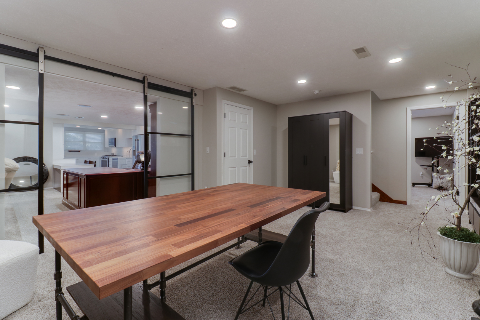 3 Pebblebrook Court Bloomington, IL 61705 - Photo 49 of 89 a kitchen with stainless steel appliances refrigerator dining table and chairs