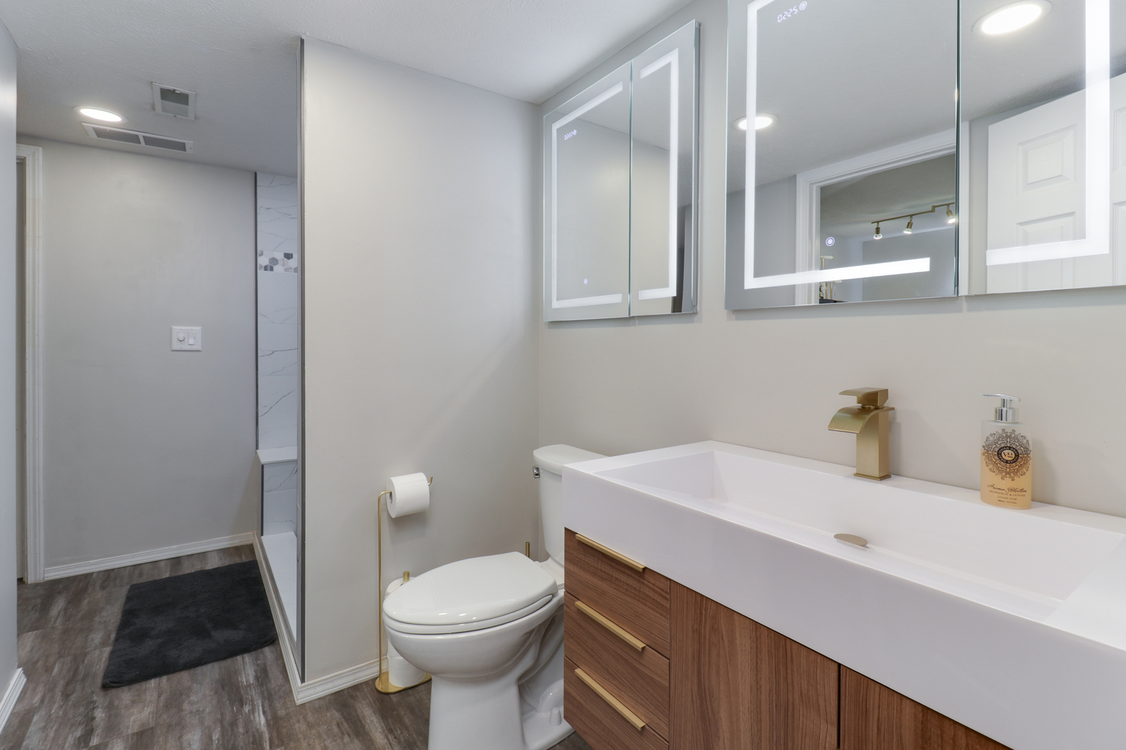 3 Pebblebrook Court Bloomington, IL 61705 - Photo 62 of 89 a bathroom with a sink toilet and vanity