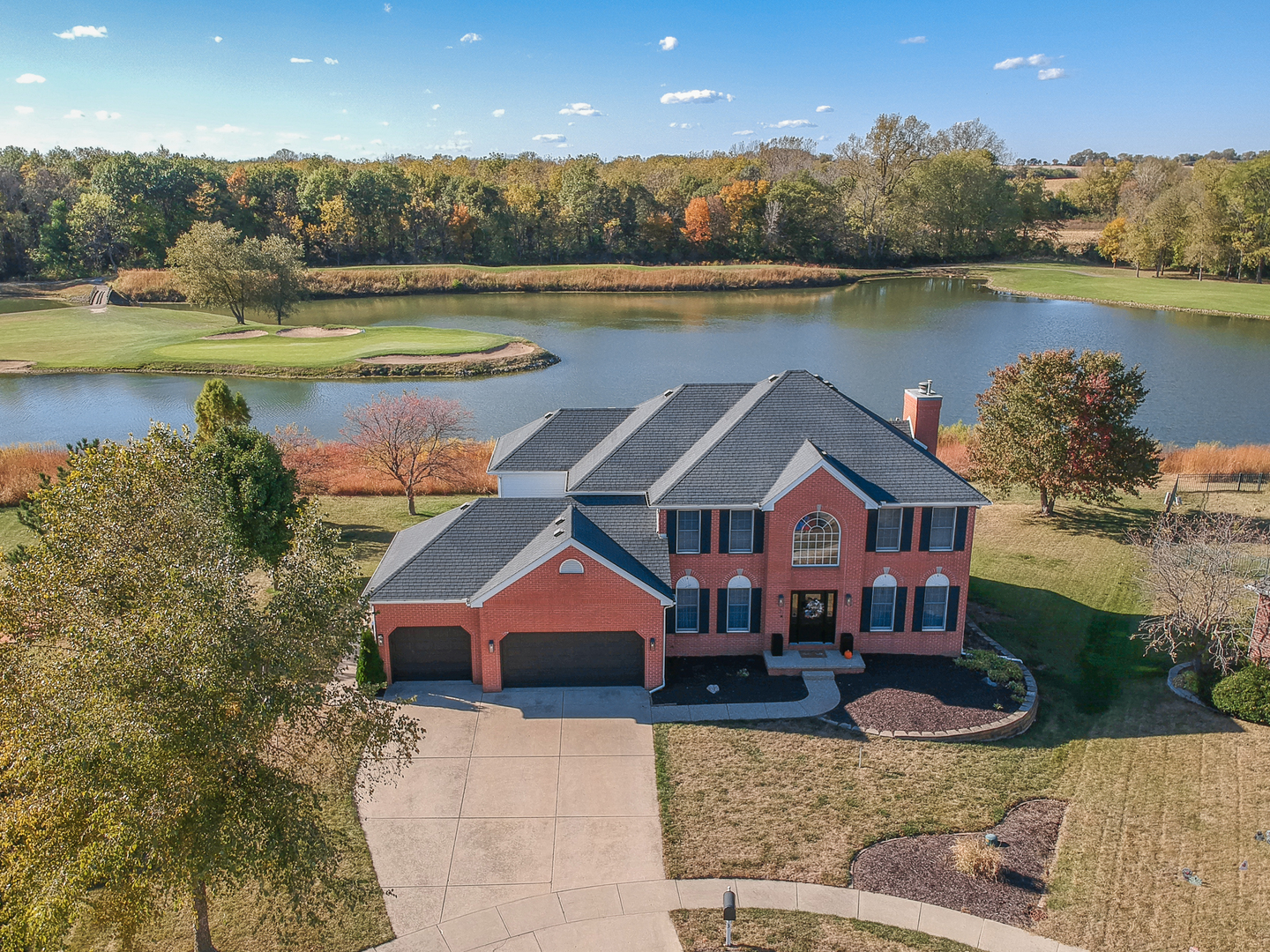 3 Pebblebrook Court Bloomington, IL 61705 - Photo 67 of 89 a view of a house with swimming pool and a yard