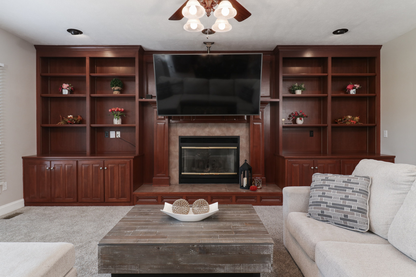 3 Pebblebrook Court Bloomington, IL 61705 - Photo 9 of 89 a living room with furniture and a fireplace