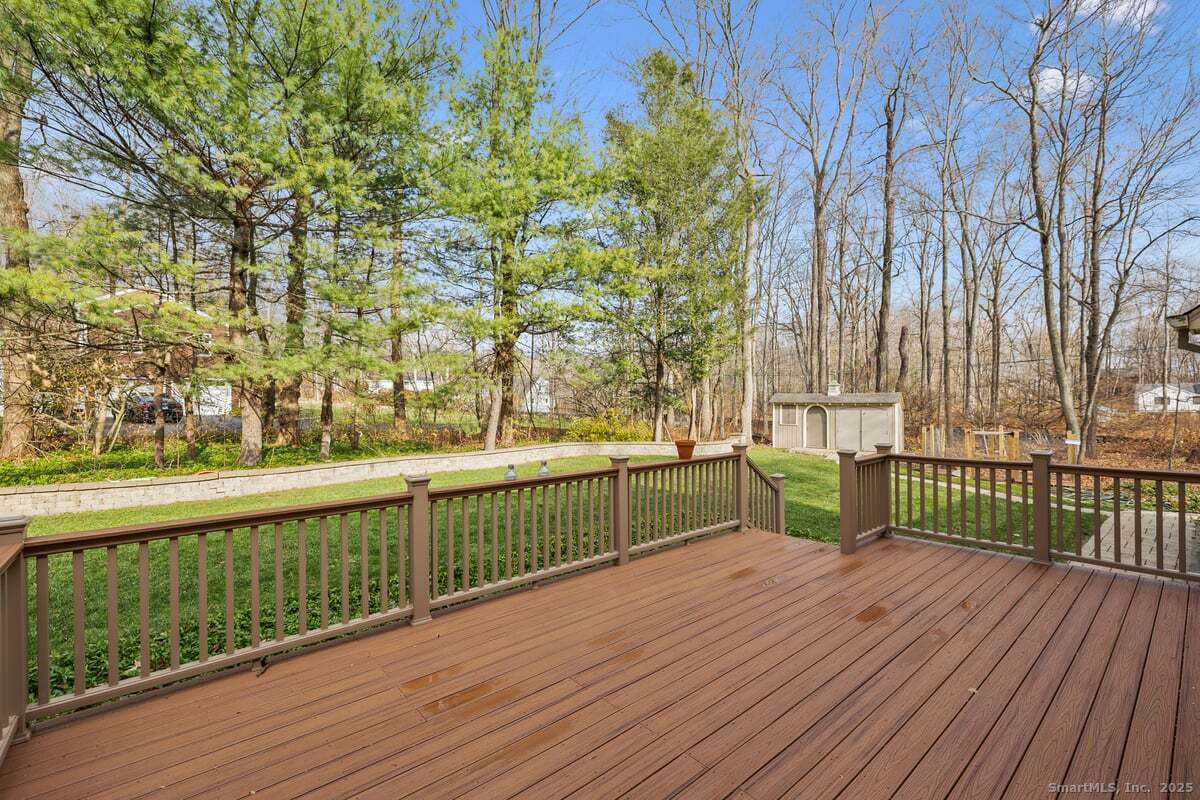 95 Ridgewood Road Ridgefield, CT 06877 - Photo 24 of 31 a view of balcony with wooden floor and fence