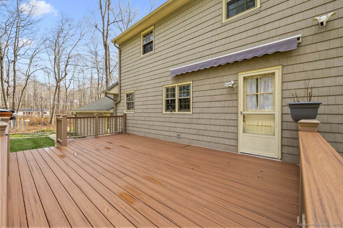 95 Ridgewood Road Ridgefield, CT 06877 - Photo 25 of 31 a view of a house with wooden floor