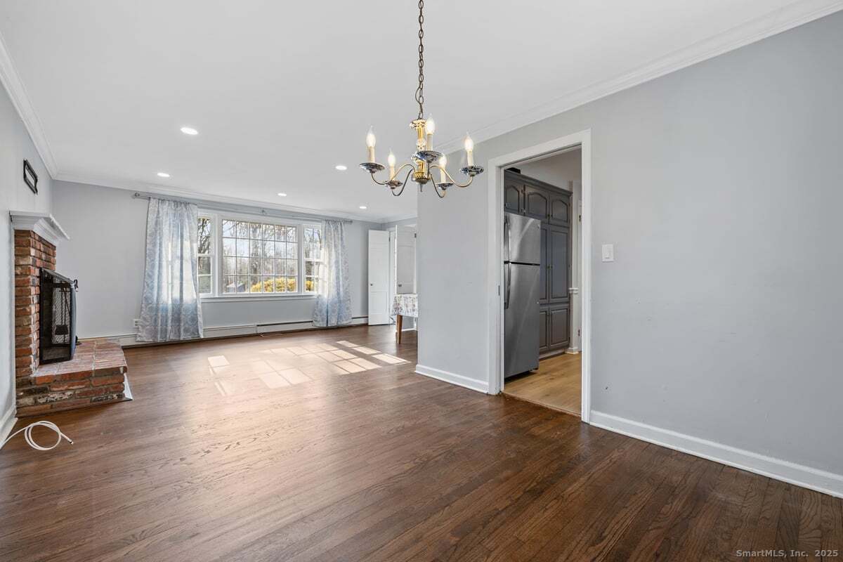 95 Ridgewood Road Ridgefield, CT 06877 - Photo 8 of 31 a view of a livingroom with a flat screen tv