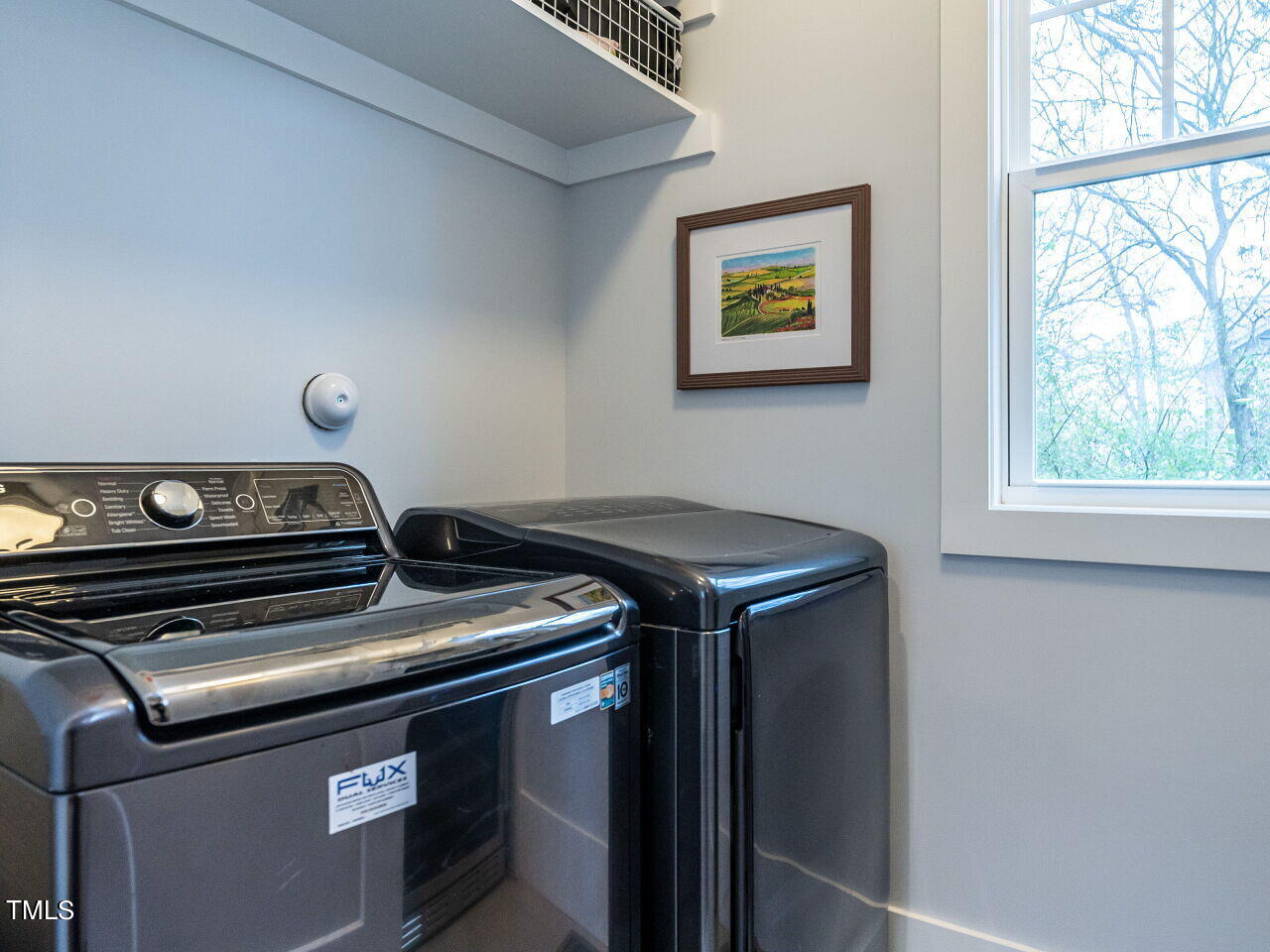 505 Mial Street Raleigh, NC 27608 - Photo 19 of 37 More storage shelves behind the door