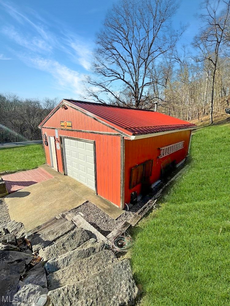 832 Cross Creek Road Colliers, WV 26035 - Photo 21 of 22 View of shed / structure with a lawn