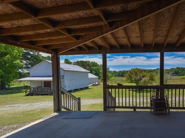 a view of a house with a big yard