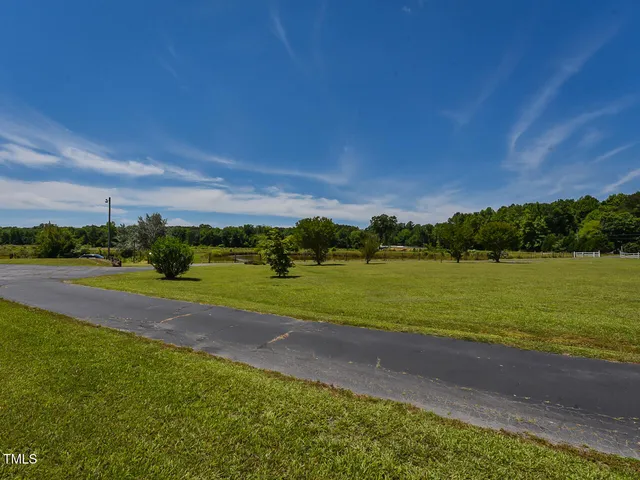 a view of a lake with a big yard