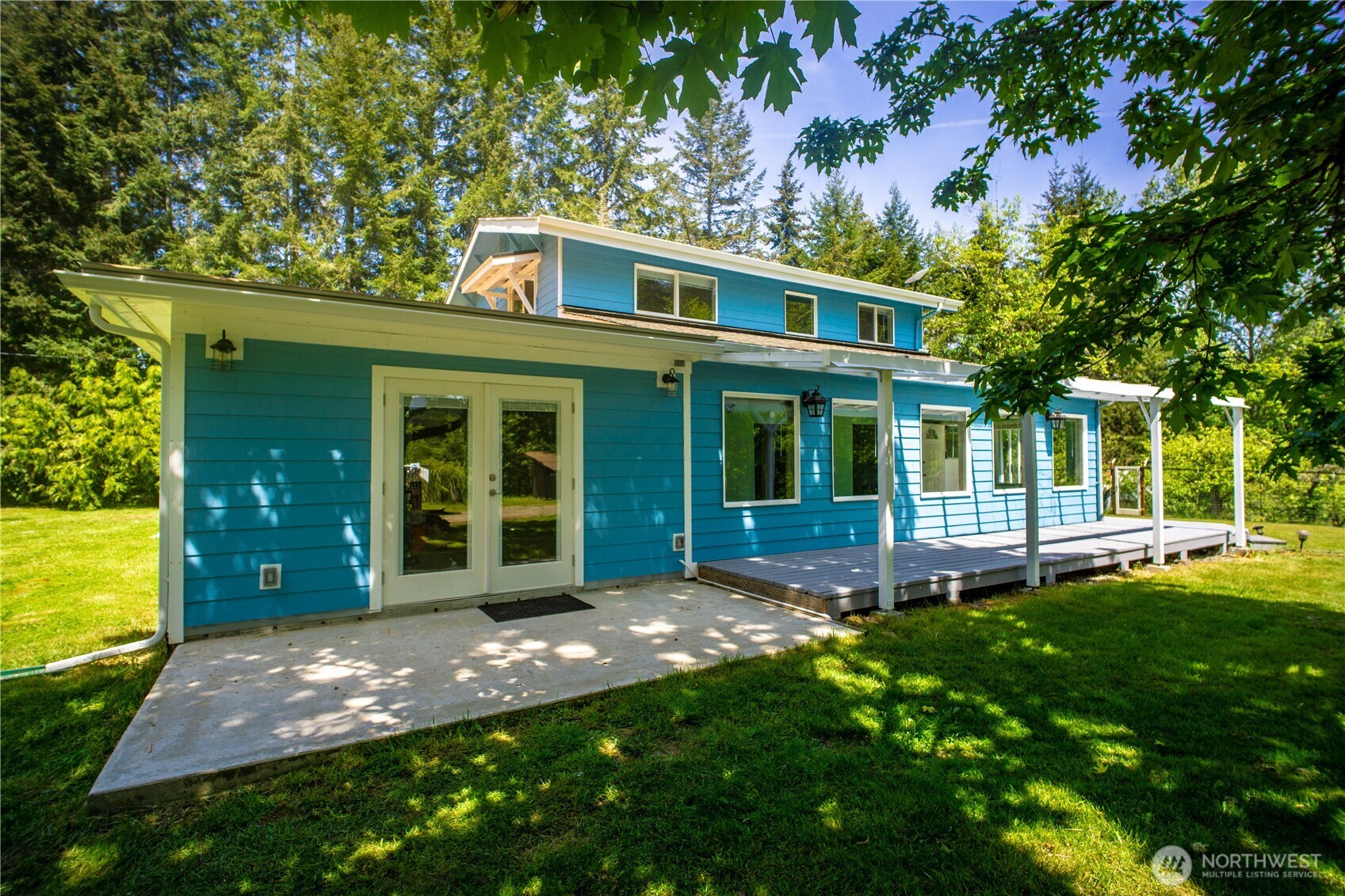 89 Slab Camp Road Sequim, WA 98382 - Photo 2 of 40 front view of a house with a yard