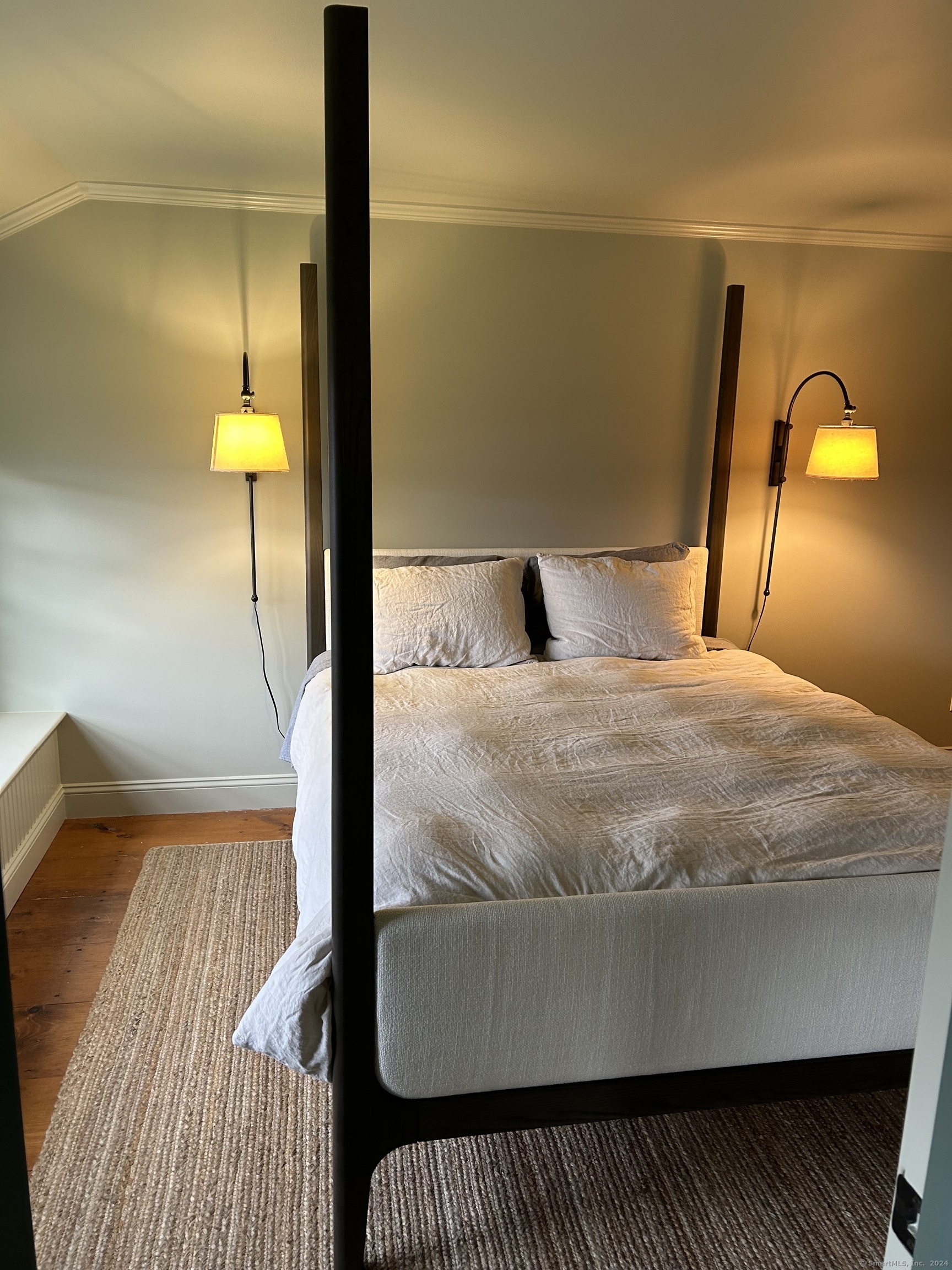 63 Cemetery Hill Road Cornwall, CT 06796 - Photo 20 of 45 a bed sitting in a bedroom next to a lamp