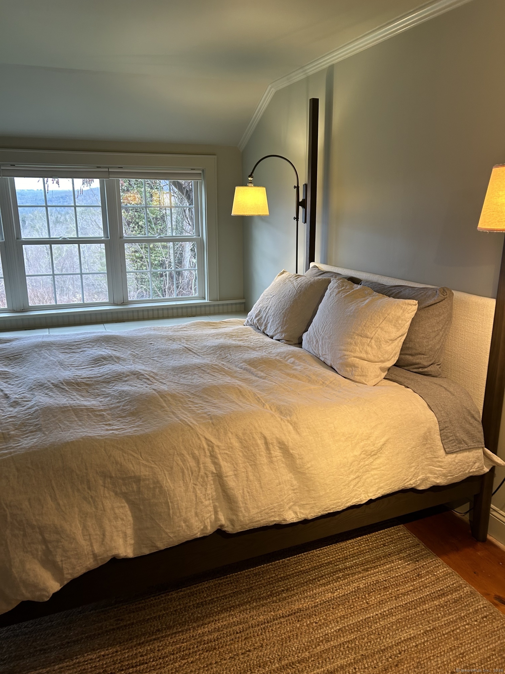 63 Cemetery Hill Road Cornwall, CT 06796 - Photo 21 of 45 a bedroom with a bed and wooden floor