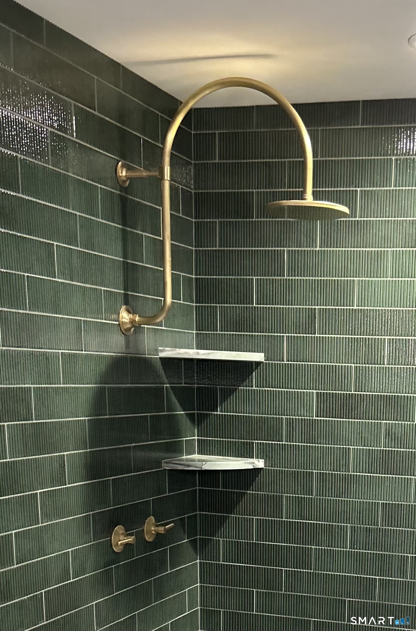 63 Cemetery Hill Road Cornwall, CT 06796 - Photo 24 of 45 a bathroom with a mirror and a blue shower