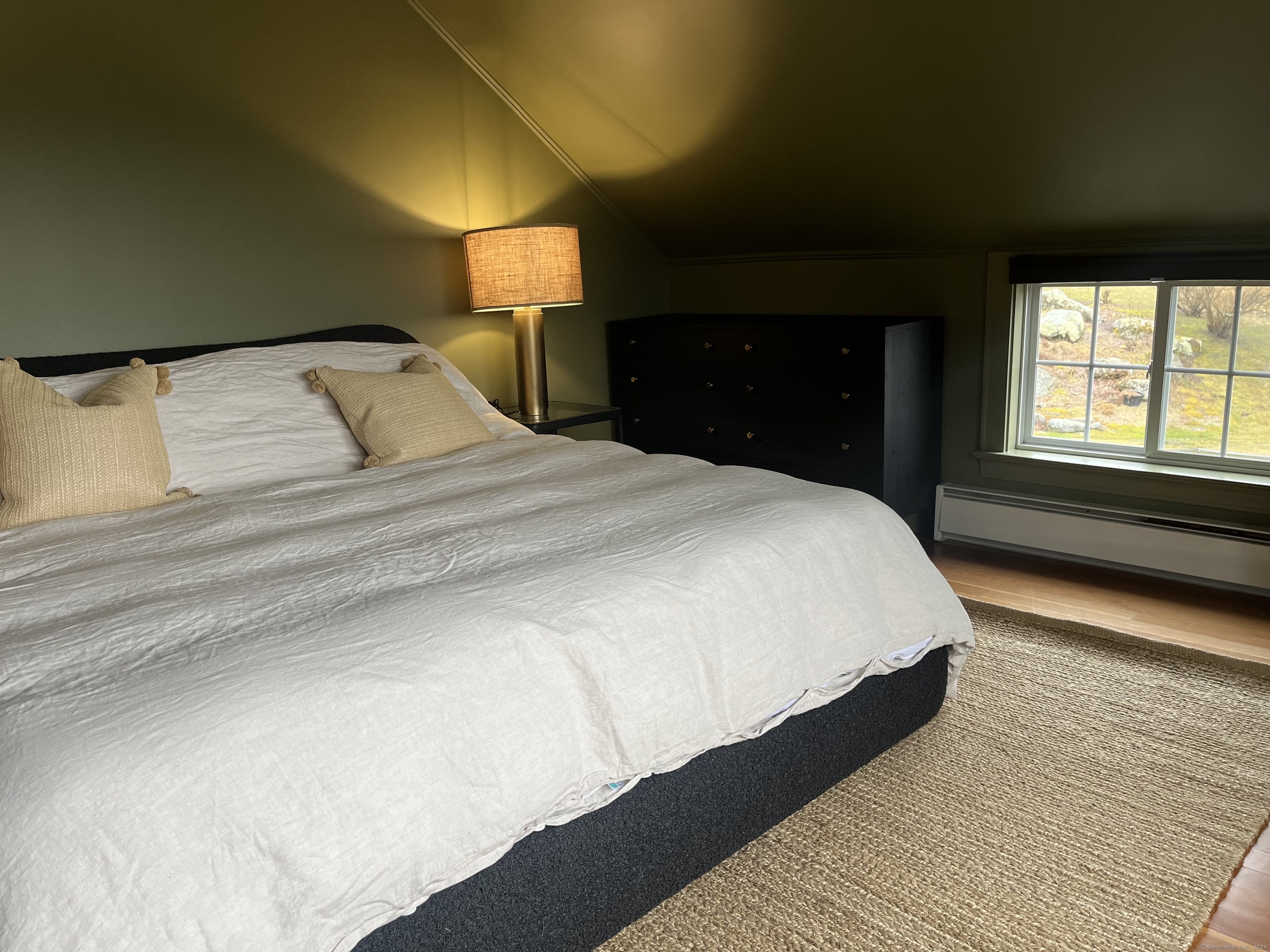 63 Cemetery Hill Road Cornwall, CT 06796 - Photo 27 of 45 a bedroom with a bed and a window