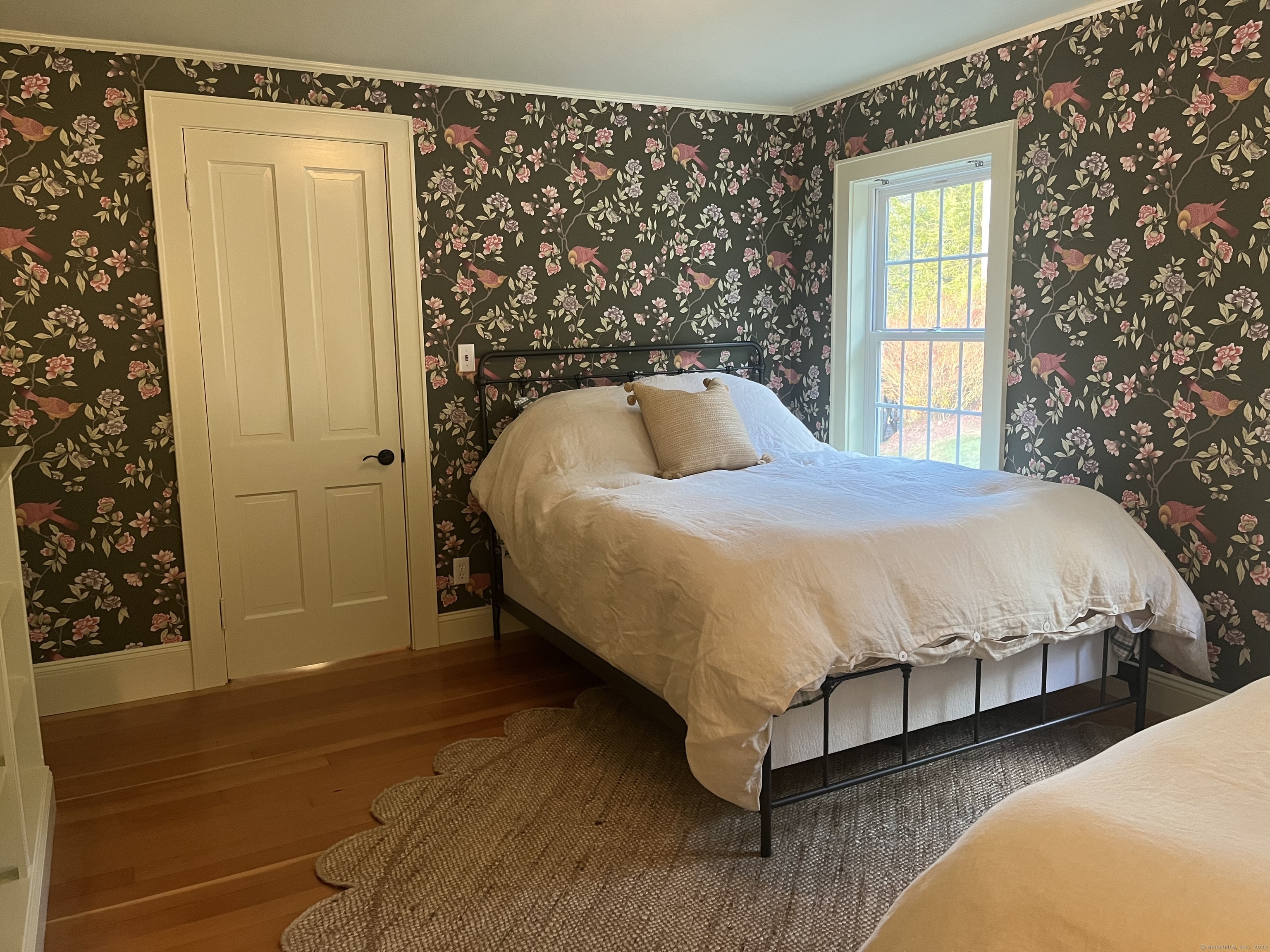 63 Cemetery Hill Road Cornwall, CT 06796 - Photo 33 of 45 a bedroom with a bed and wooden floor