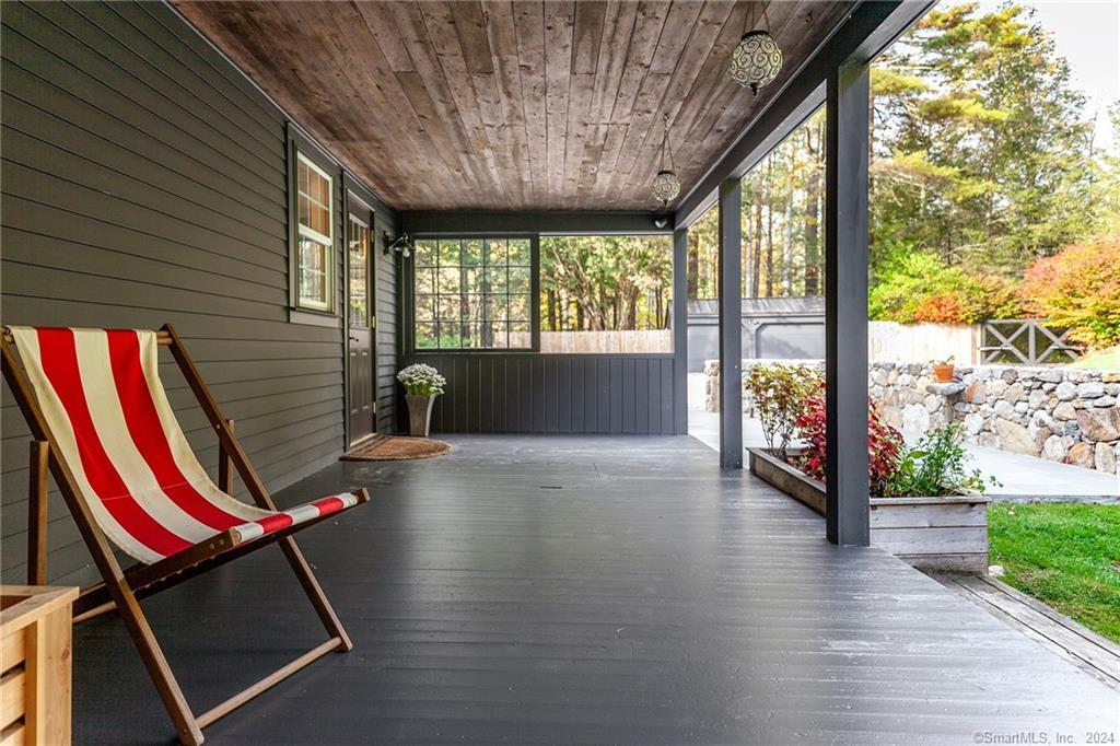 63 Cemetery Hill Road Cornwall, CT 06796 - Photo 34 of 45 a view of an empty room with wooden floor and a iron fence