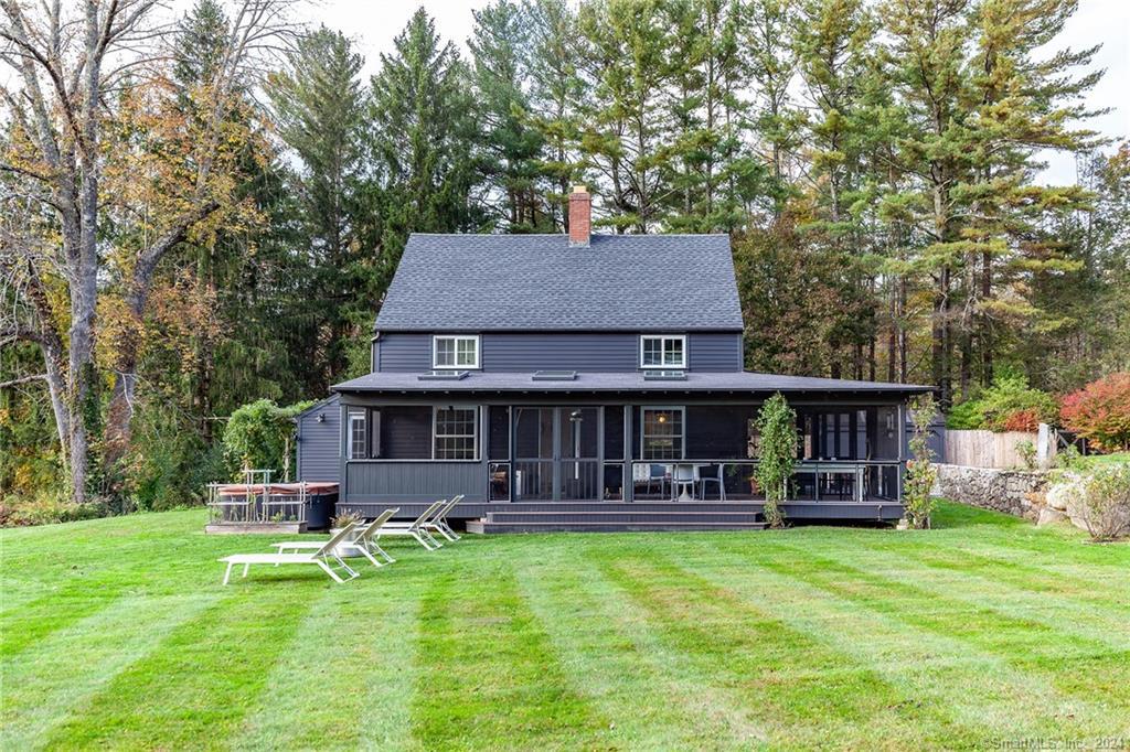 63 Cemetery Hill Road Cornwall, CT 06796 - Photo 41 of 45 a house view with a sitting space and garden