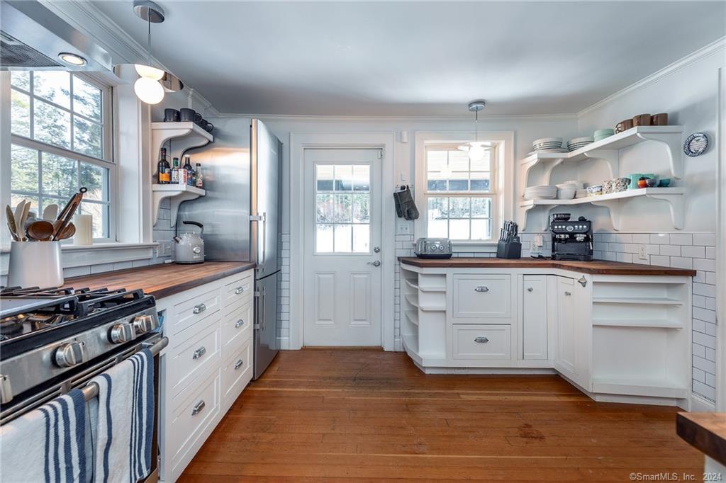 63 Cemetery Hill Road Cornwall, CT 06796 - Photo 7 of 45 a kitchen with stainless steel appliances granite countertop a stove and a sink