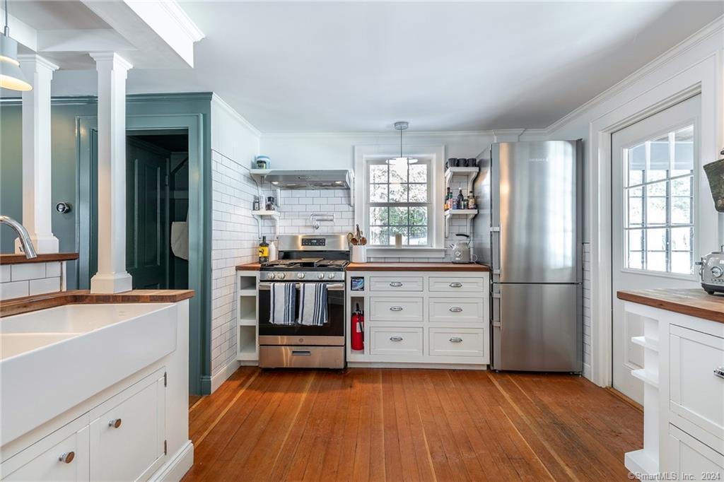 63 Cemetery Hill Road Cornwall, CT 06796 - Photo 8 of 45 a kitchen with stainless steel appliances a stove and a refrigerator