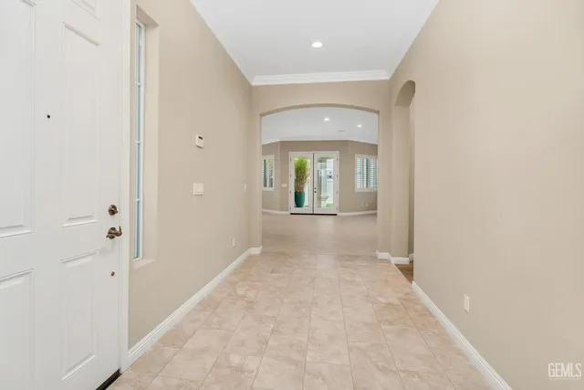 a view of a livingroom with furniture and a window