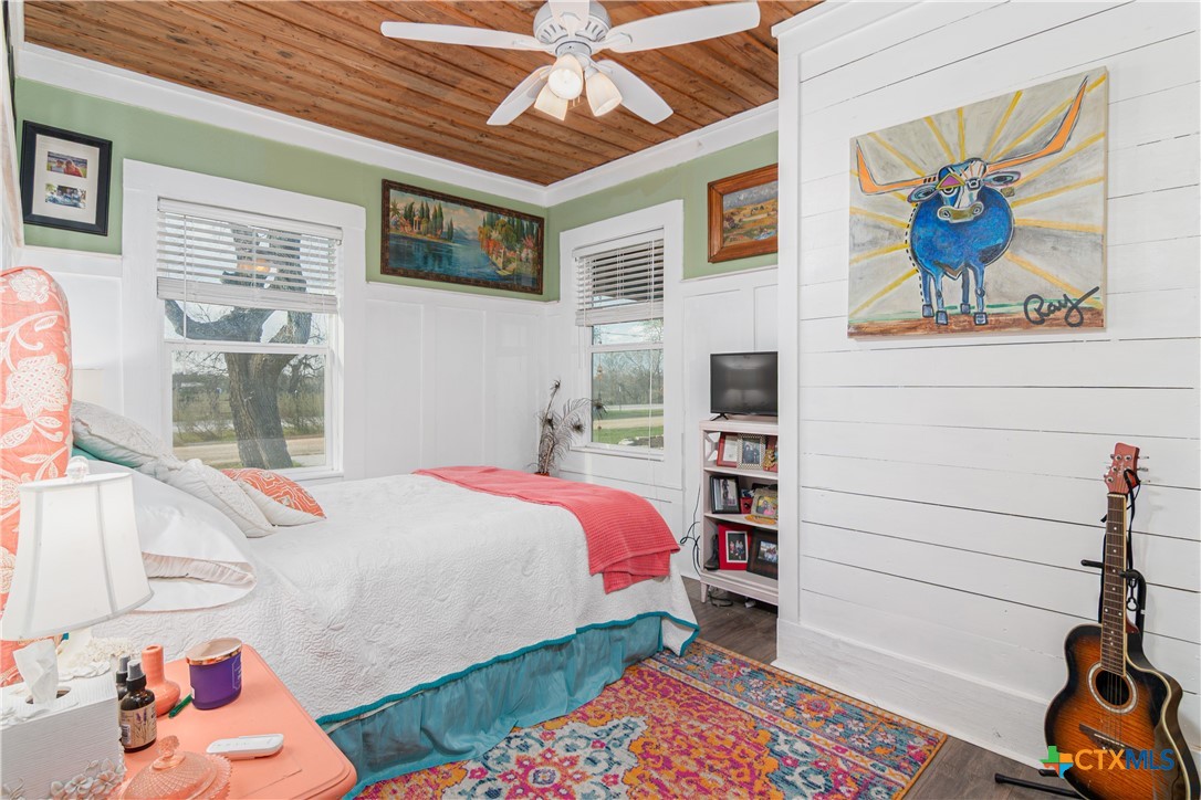 7150 Linne Road Seguin, TX 78155 - Photo 13 of 43 a bedroom with a bed and a window